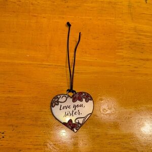 Hallmark “Love you sister” tie on.